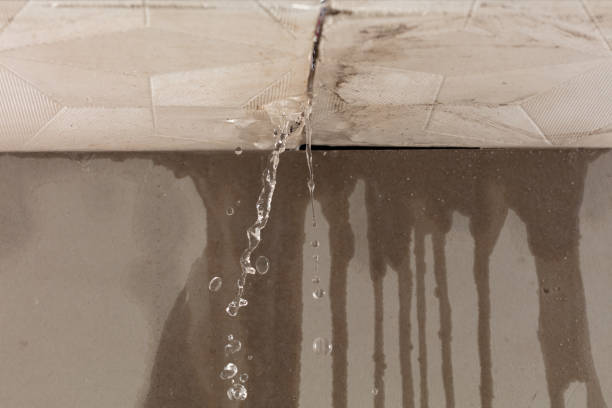 Professional Flood Damage Cleanup technician working in Baden, PA